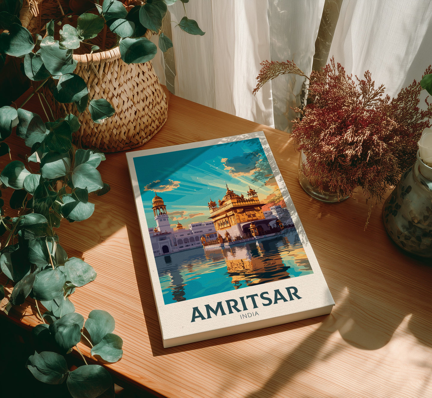 Canvas with Amritsar cover on a wooden table with plants