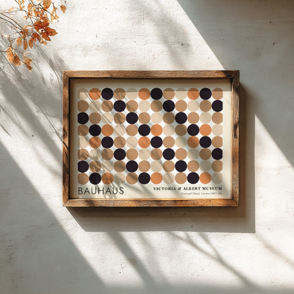 Wall art poster featuring a geometric Bauhaus grid of tan, orange, and black circles.