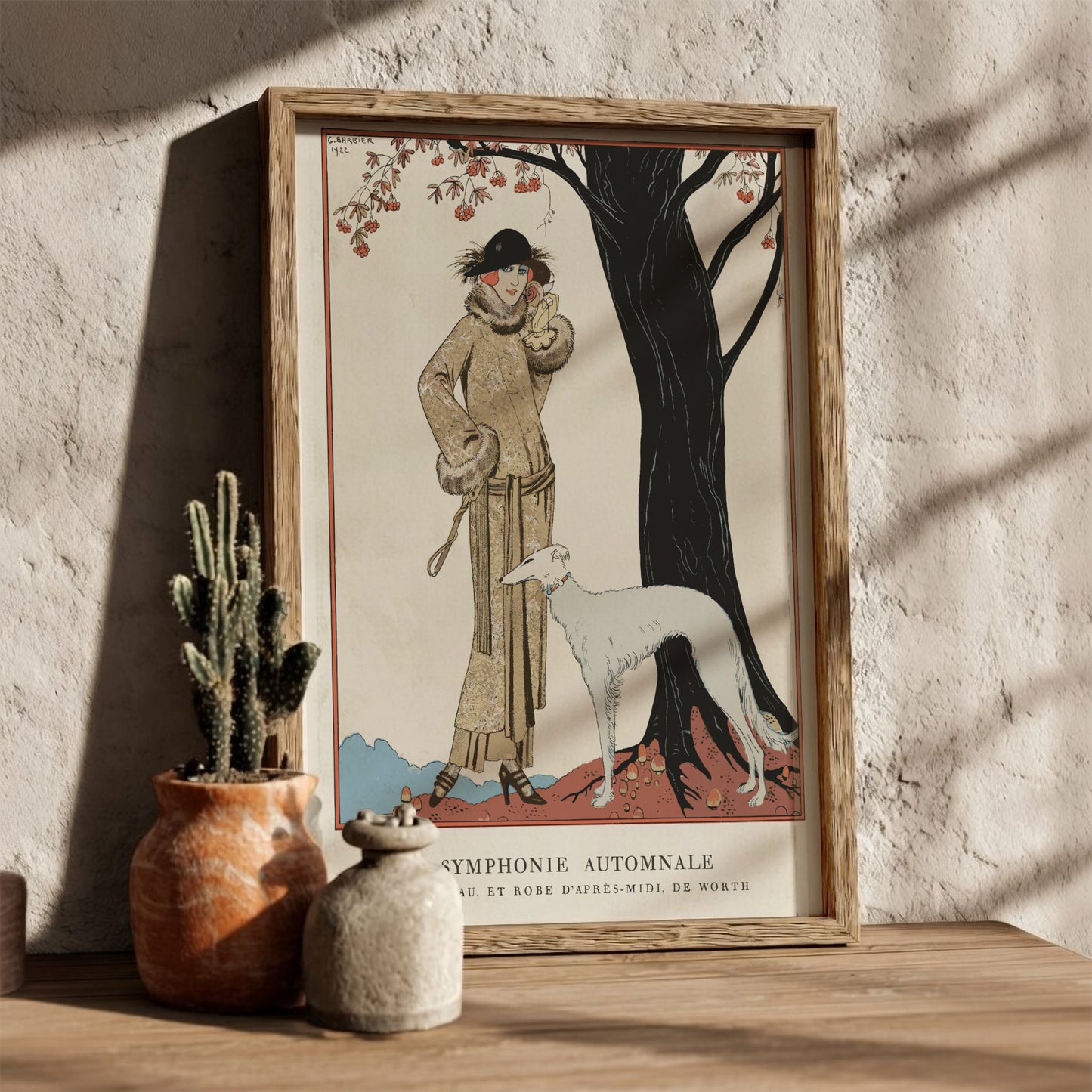 Art Nouveau poster of "Autumn Symphony" by George Barbier, featuring a woman and dog in vintage fashion.