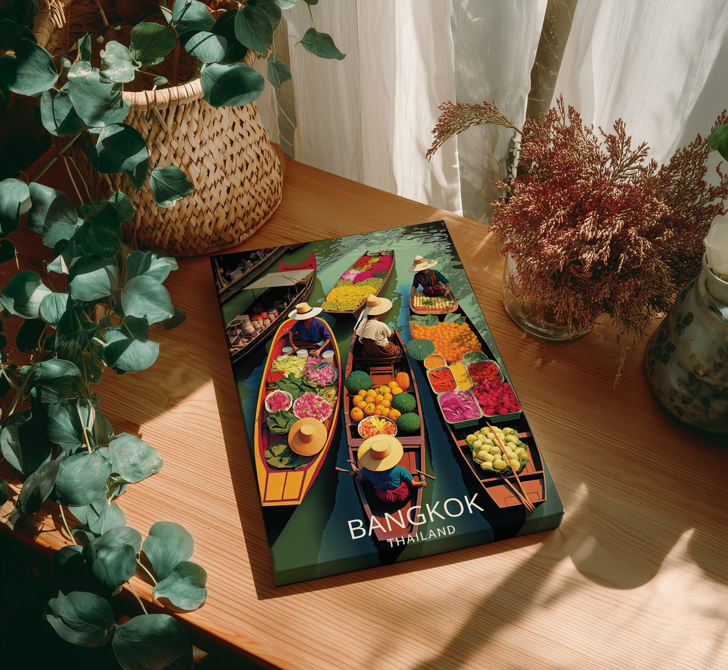 Book titled 'Bangkok, Thailand' on a wooden table with plants around