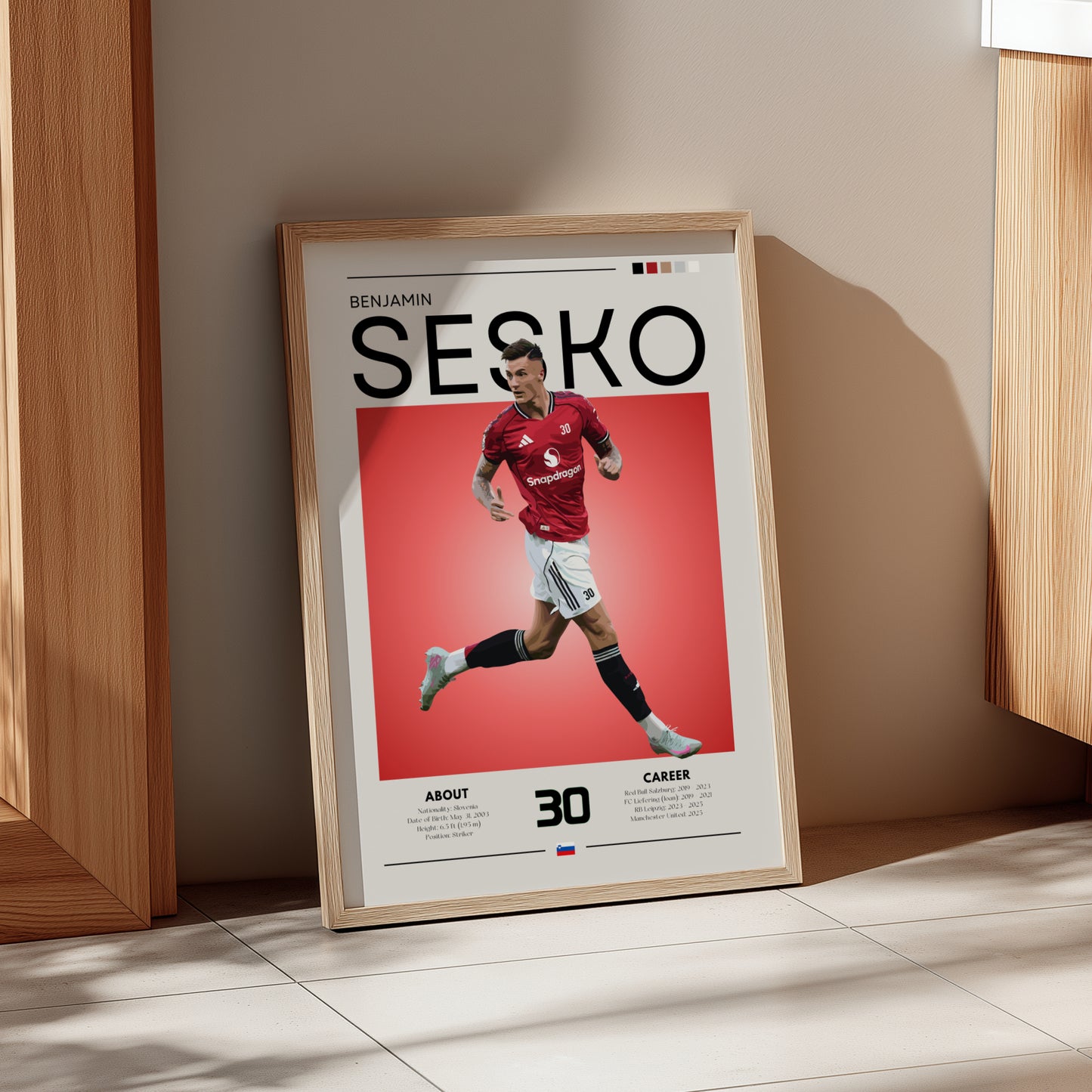Framed poster of a soccer player with 'Benjamin Sesko' on a red background