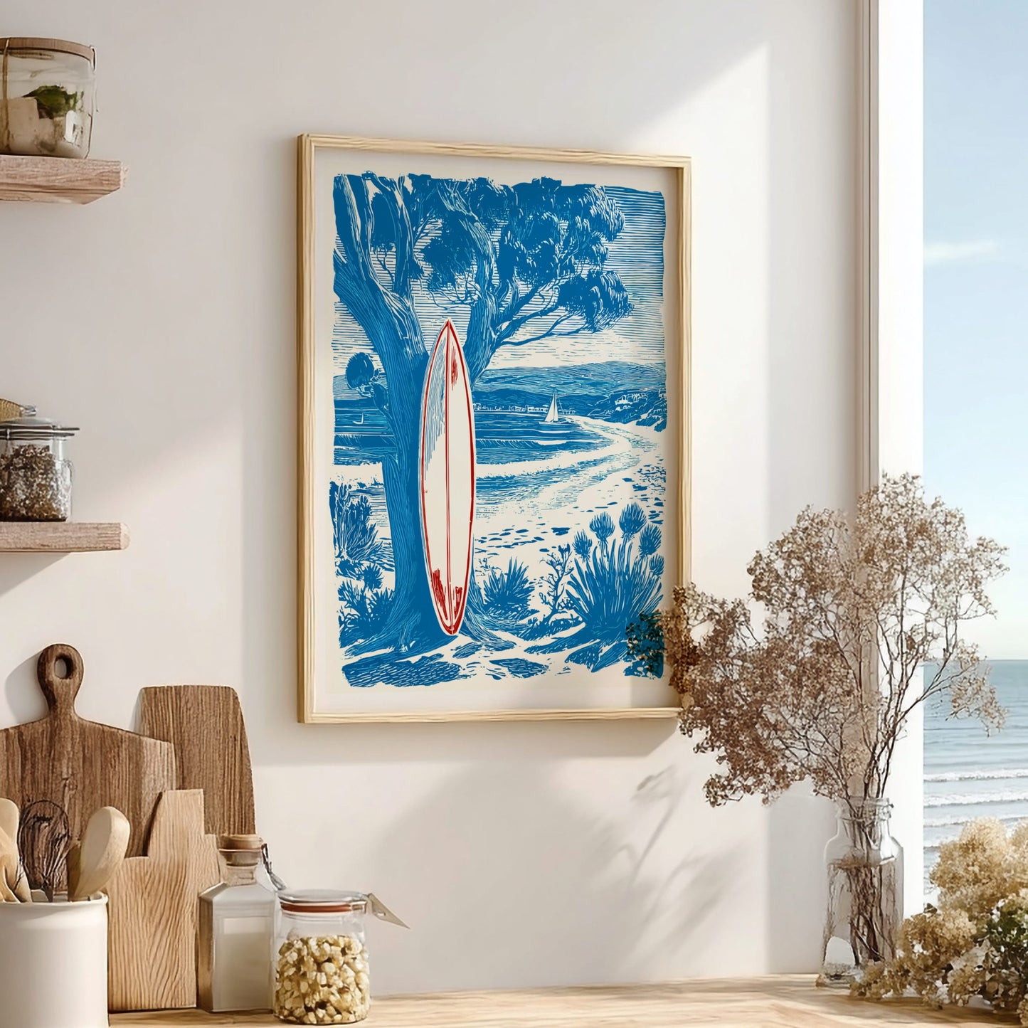 Framed artwork of a surfboard in a natural setting on a wall in a room with decor elements.