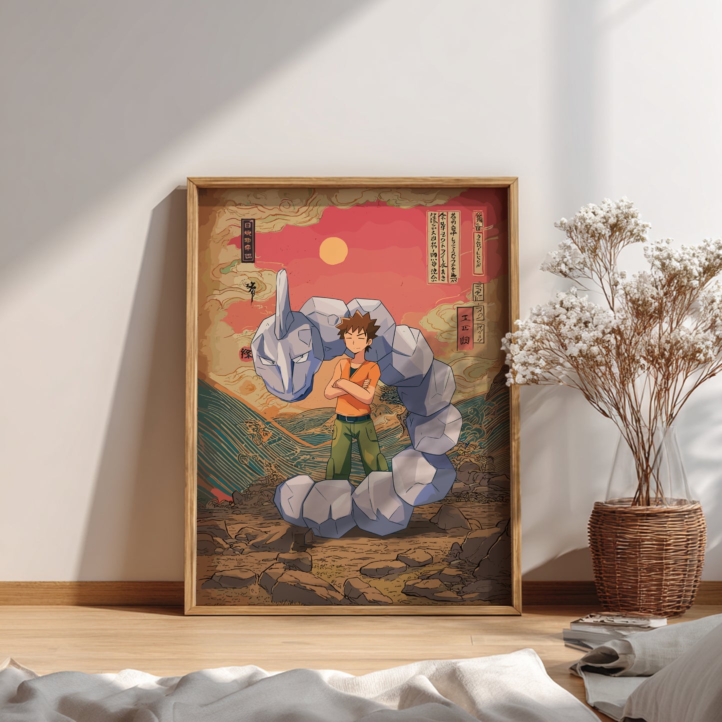 Framed artwork of Brock and Onix Pokemon on a wall in a room with a plant and decor.