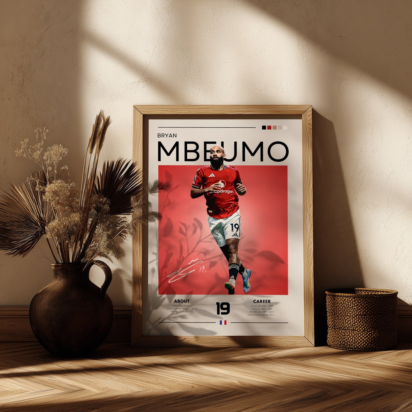 Framed sports poster of a player on a wooden shelf with decorative elements.