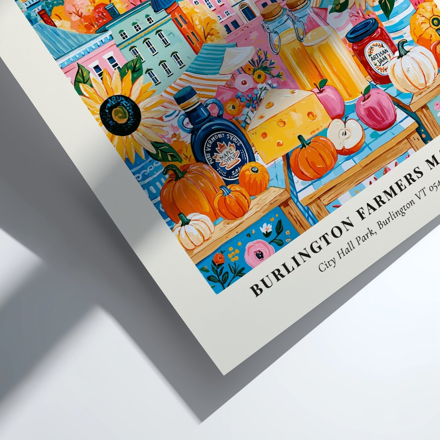 Burlington Farmers Market poster featuring colorful pumpkins and city backdrop in warm tones