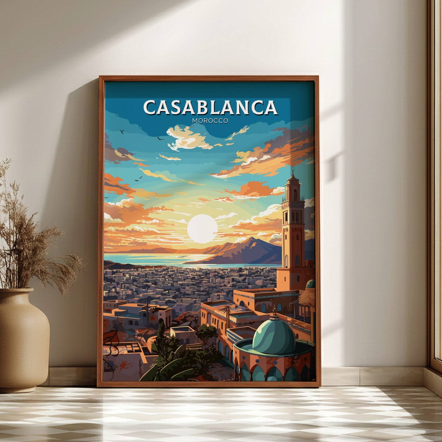 Framed poster of Casablanca with a cityscape and sunset, placed on a wall.