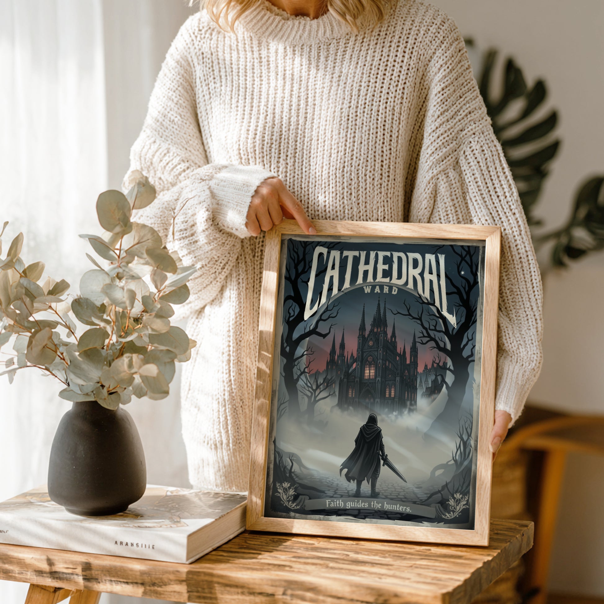 Person holding a framed print of Cathedral Ward from Bloodborne