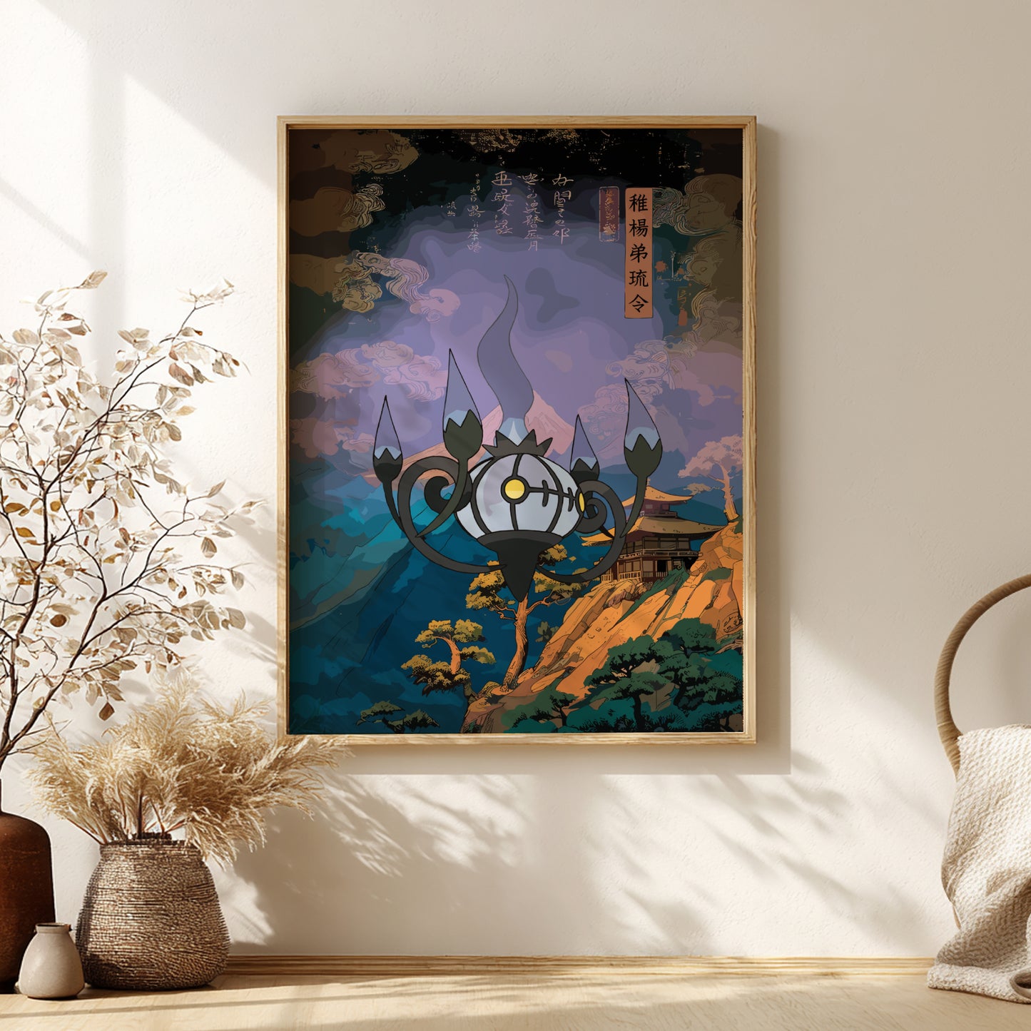 Framed artwork of a stylized Chandelure Pokemon against a mountainous landscape on a wall with decorative elements.