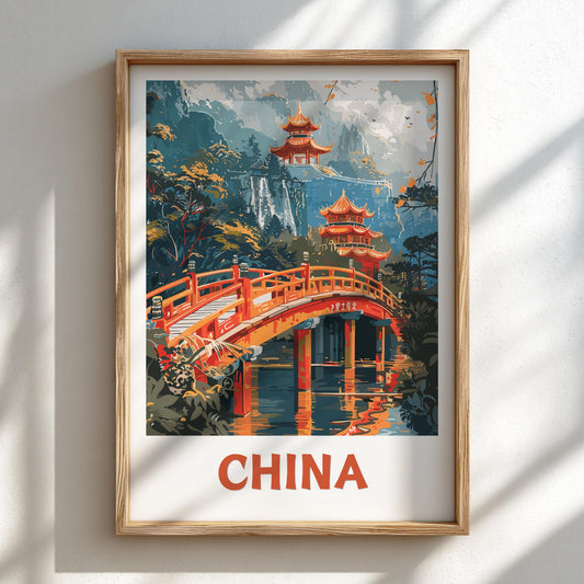 Framed artwork of a Chinese landscape with pagodas and a bridge on a wall.