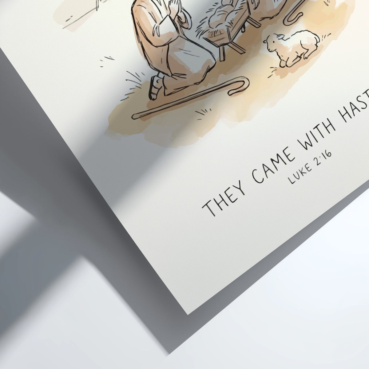 Poster featuring a minimalist nativity scene with shepherds, a manger, and a lamb.