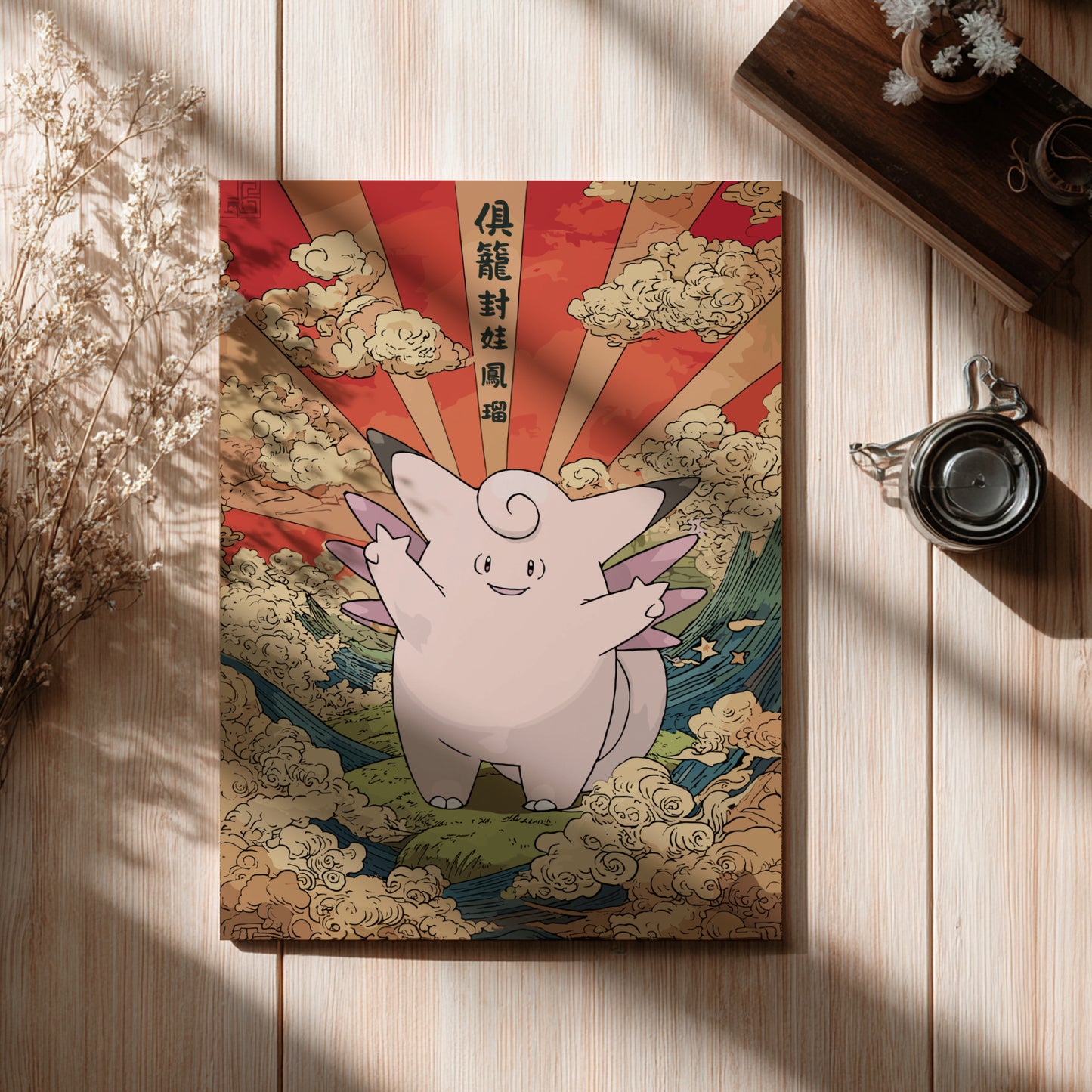 Illustrated Clefable Pokemon on a decorative card with Japanese text on a wooden surface
