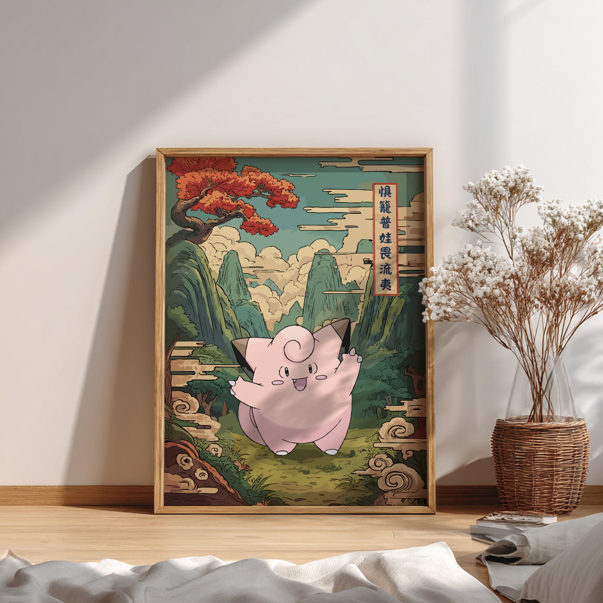Framed artwork of Clefairy Pokemon character in a scenic setting on a wall.