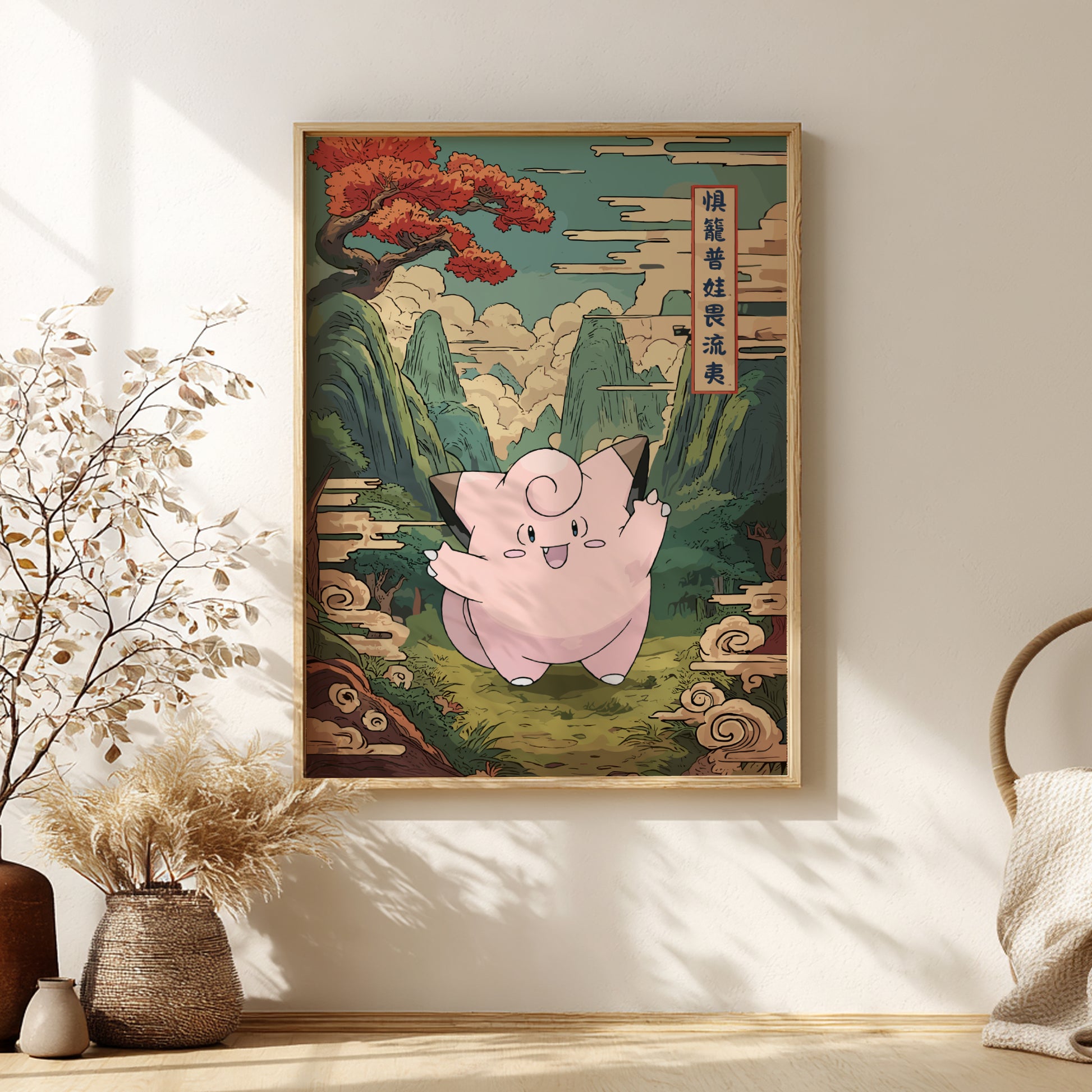Framed artwork of Clefairy Pokemon in a mountainous landscape on a wall.