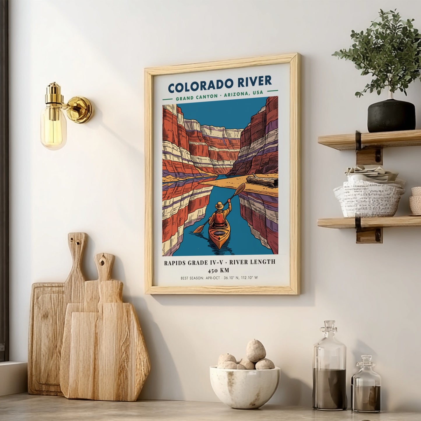 Poster of a kayaker on the Colorado River surrounded by colorful Grand Canyon cliffs.