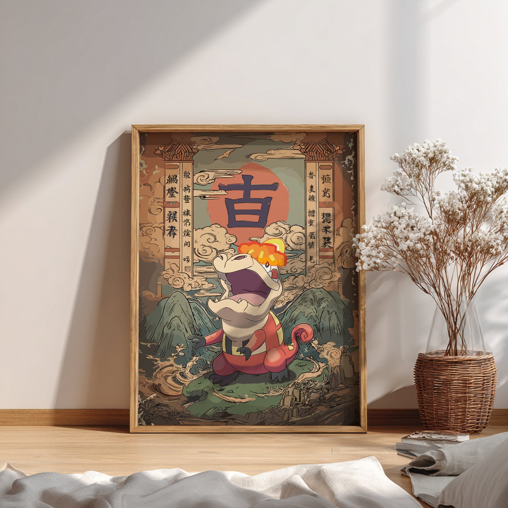 Framed artwork with a traditional design on a wall next to a vase with dried flowers.