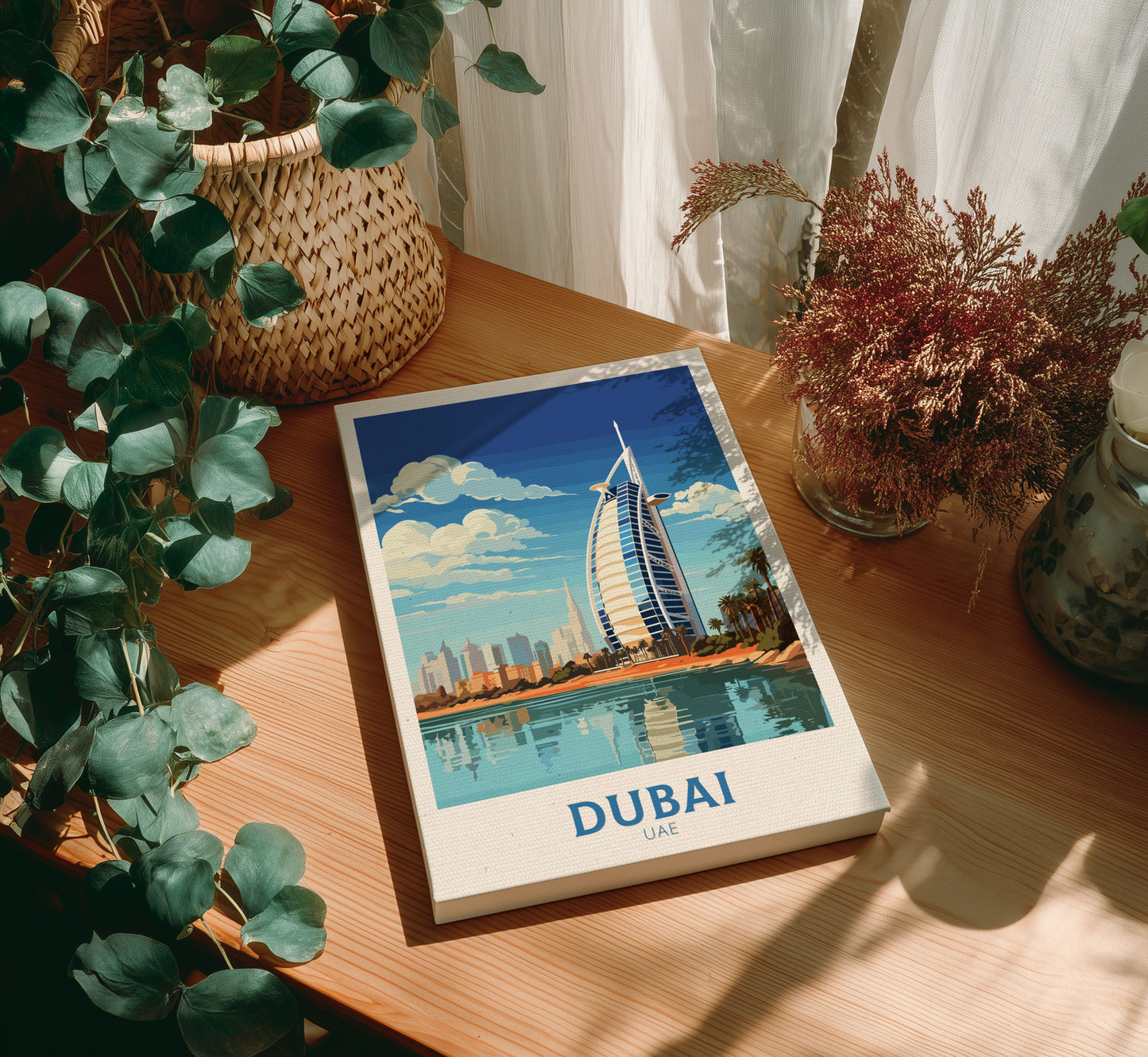 Canvas with Dubai illustration on a wooden table with plants