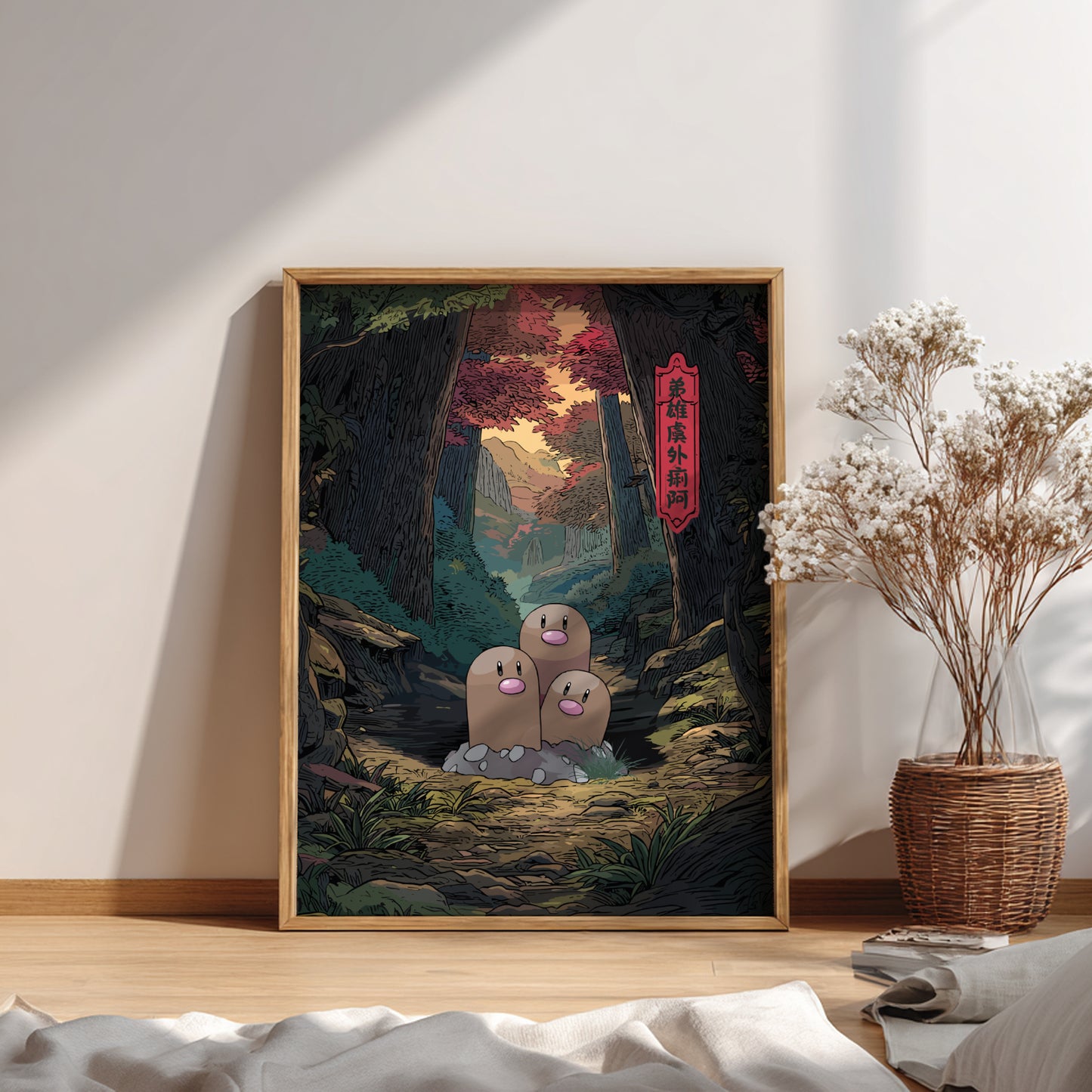Framed artwork of Dugtrio Pokemon characters in a natural setting on a wall.