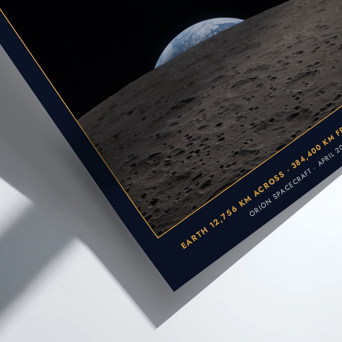 Earthset poster featuring a view of Earth rising over the cratered moon surface landscape