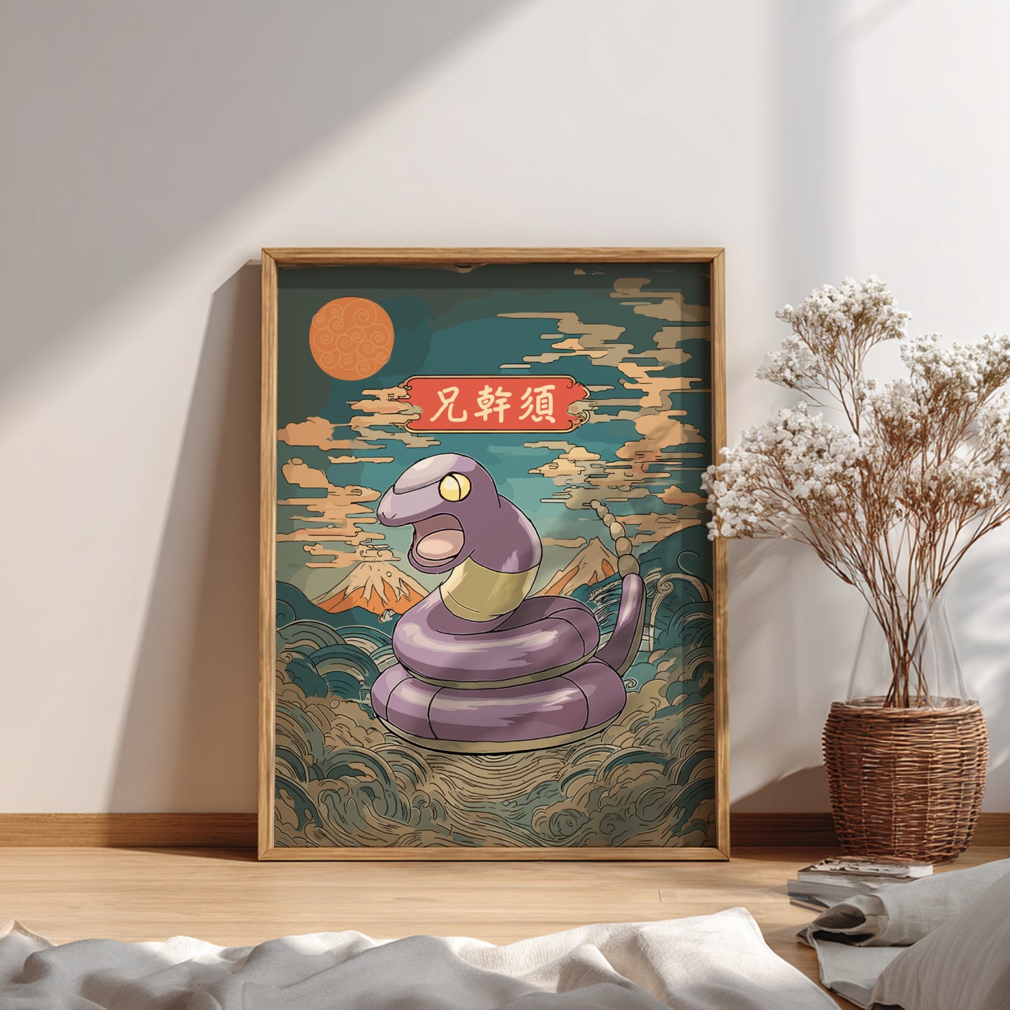 Framed artwork of Ekans Pokemon with a mountain and sun in the background, placed on a wooden floor.
