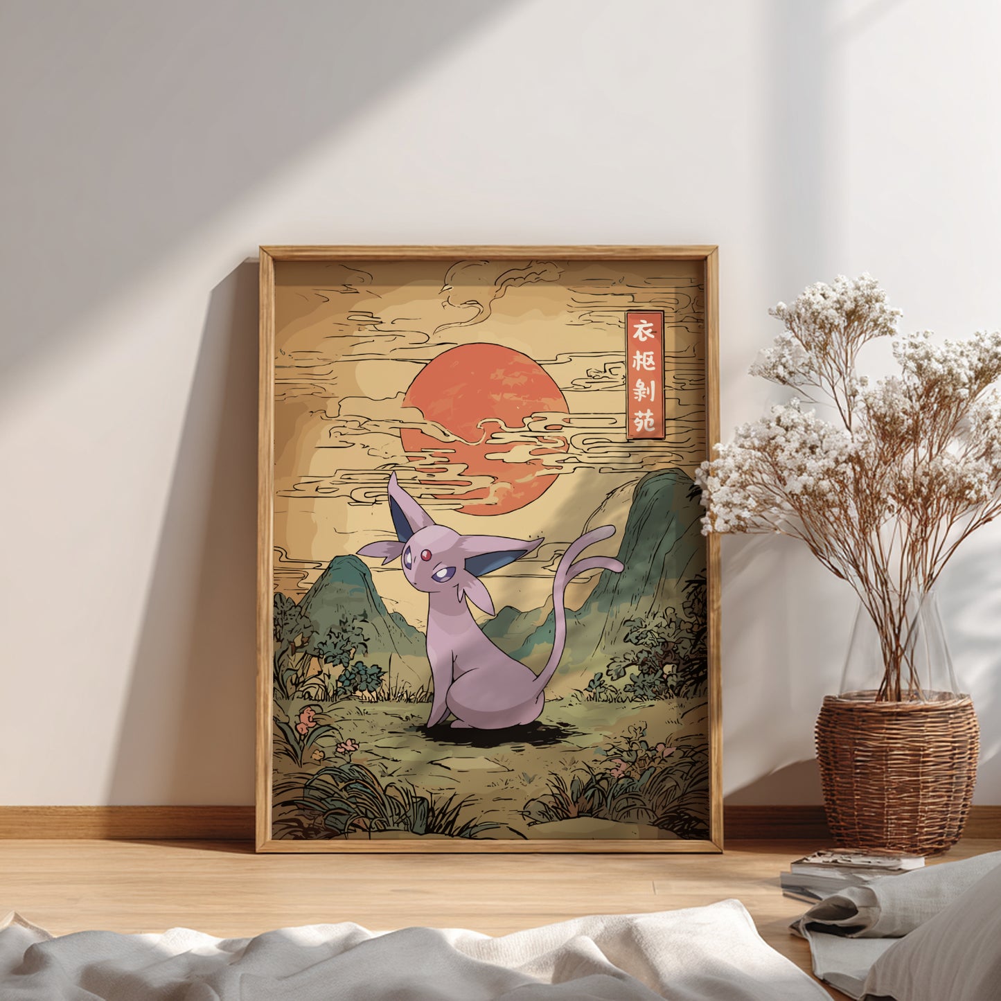 Framed artwork of Espeon Pokemon in a natural setting on a wall.