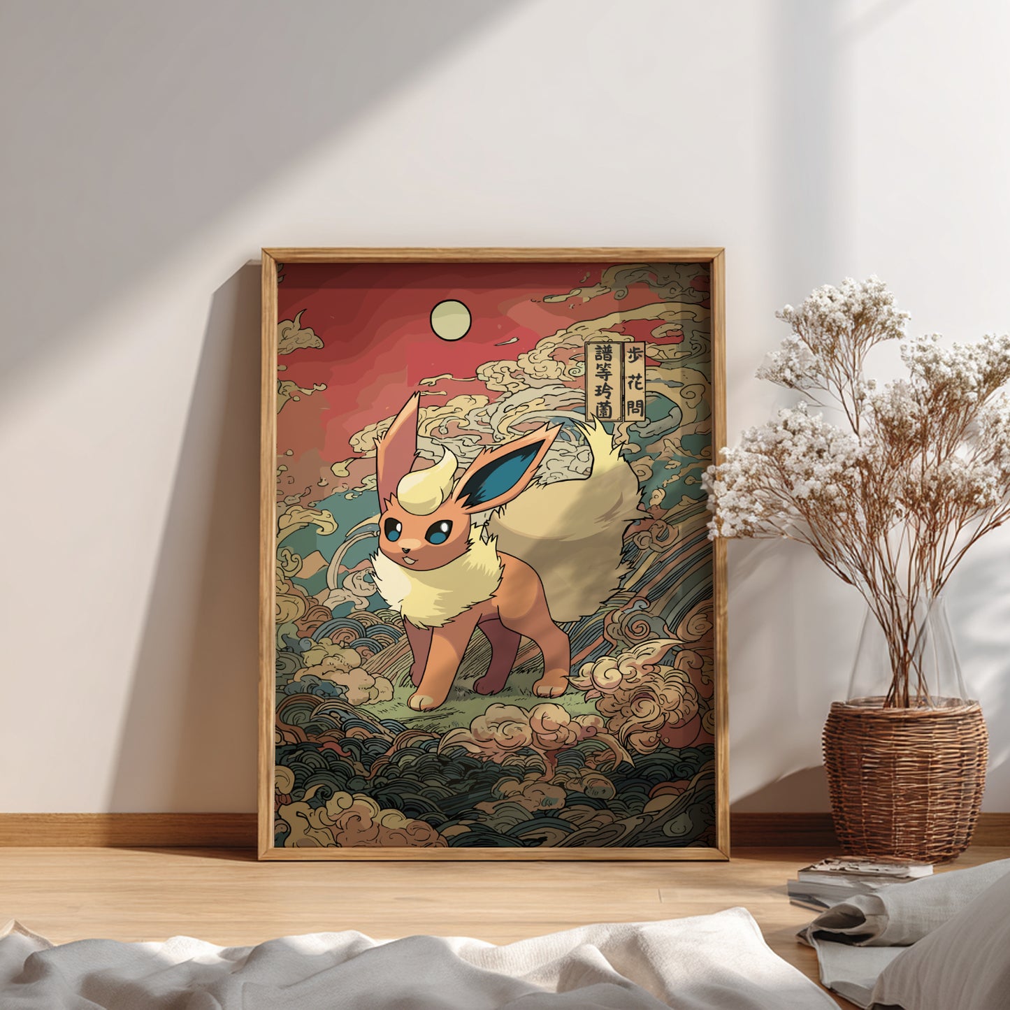 Framed artwork of a stylized Flareon Pokemon character on a wall with a vase of flowers.
