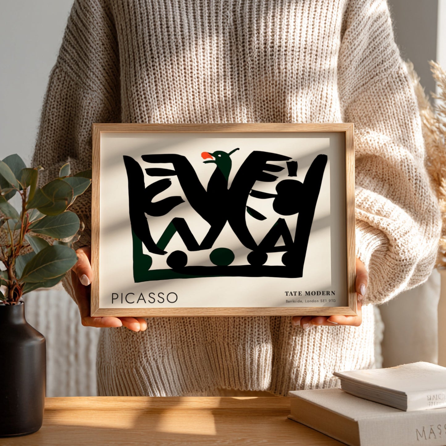 Pablo Picasso poster featuring fragmented portrait design with black shapes and green accents