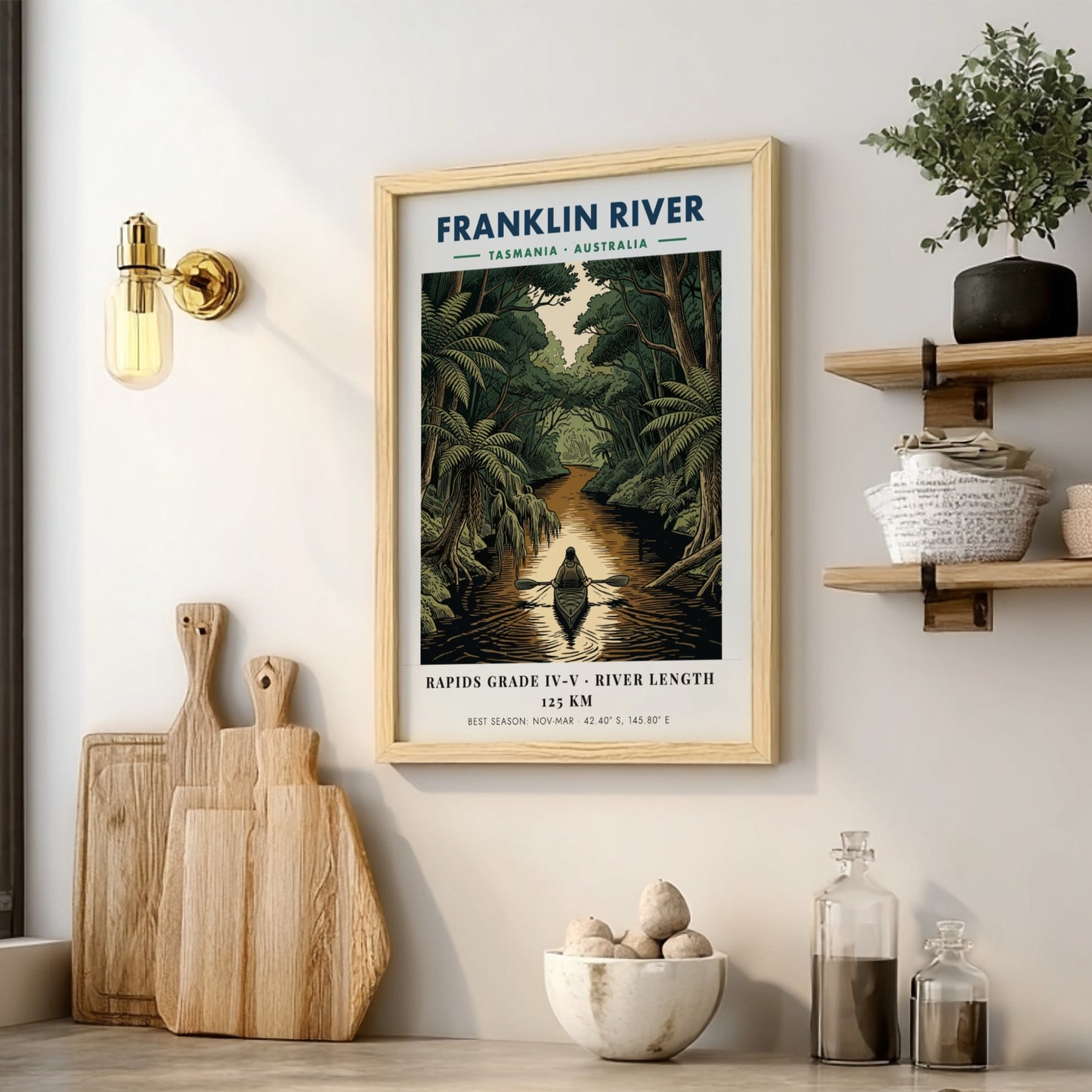 Poster featuring a solo kayaker on the Franklin River in Tasmania amidst lush forests.
