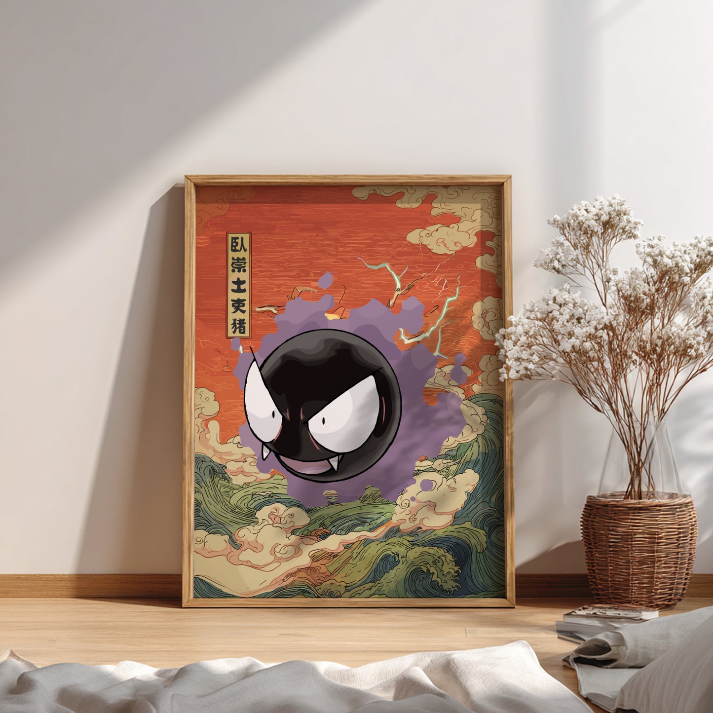 Framed artwork with a stylized Gastly Pokemon on an abstract background in a room with a vase and decor.