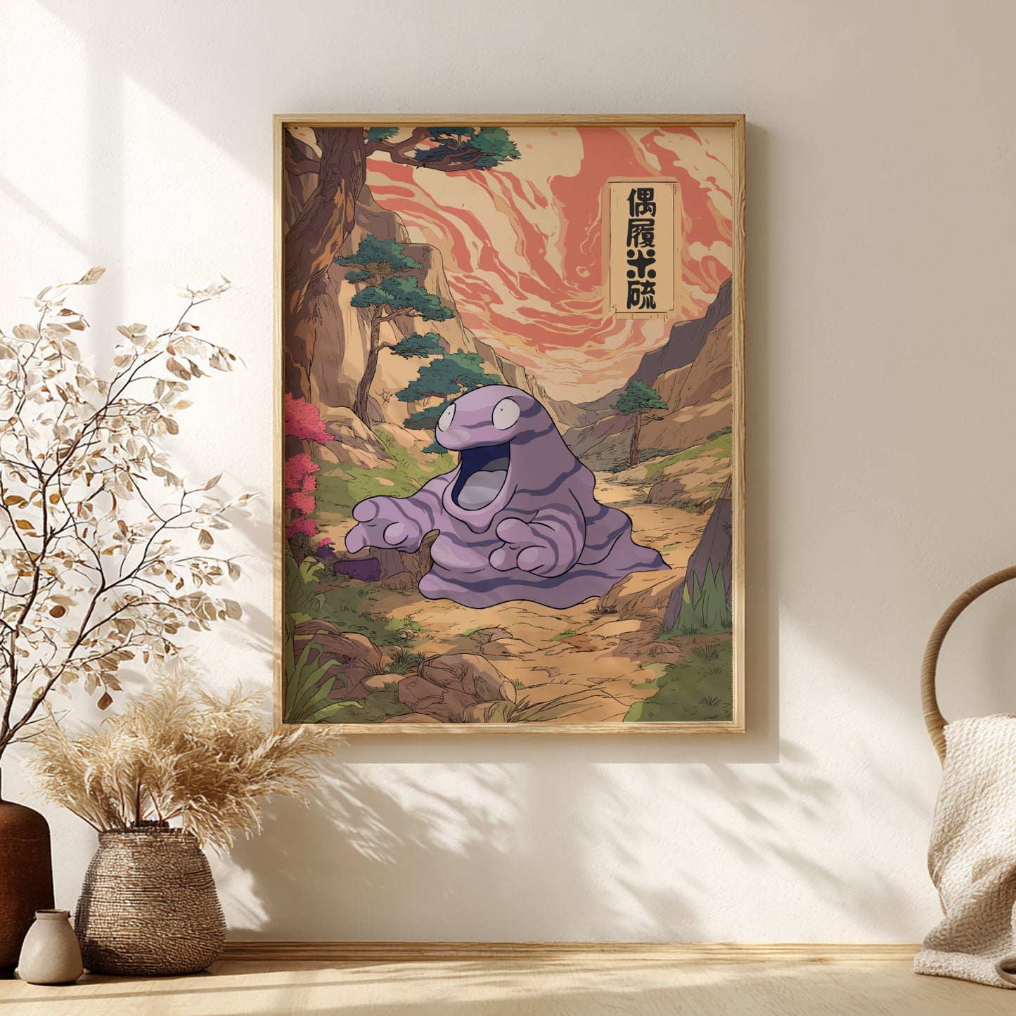 Framed artwork of Grimer Pokemon in a natural setting on a wall with decorative elements.