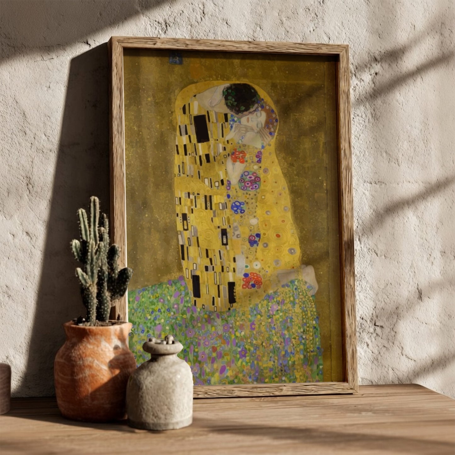 Gustav Klimt's The Kiss art poster, featuring a couple in a golden robe amidst floral patterns.