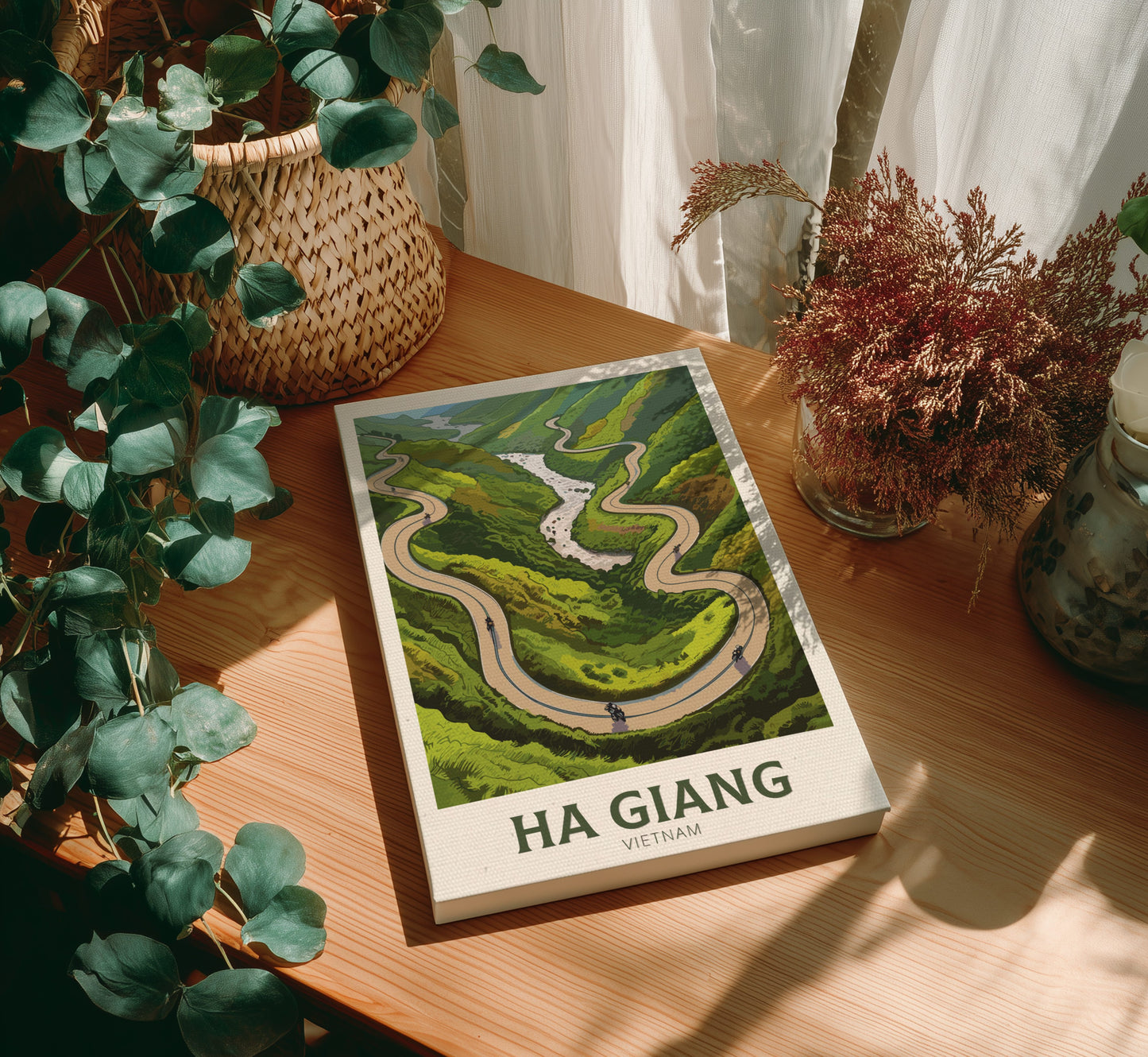 Canvas 'Ha Giang Vietnam' on a wooden table with plants around