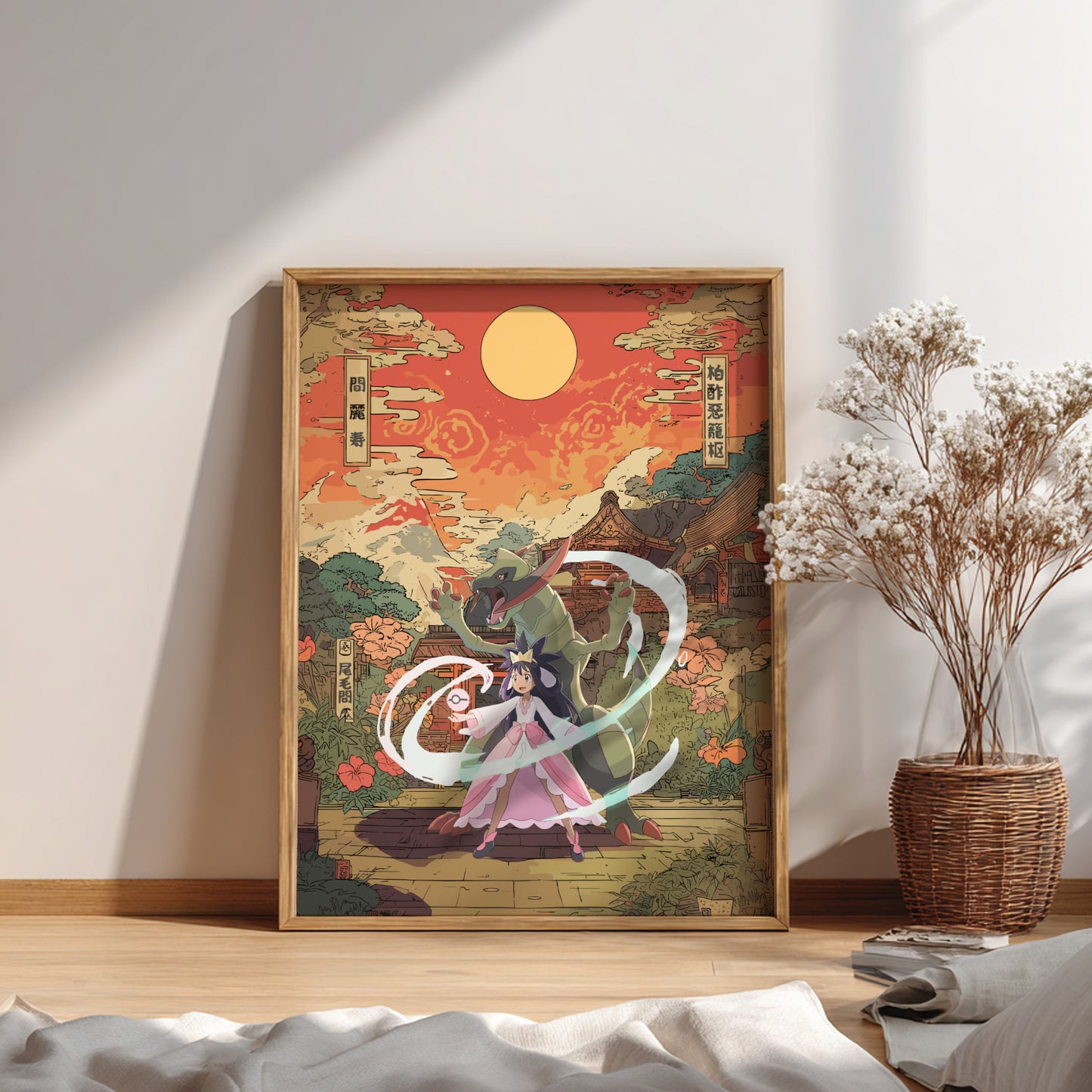 Framed artwork with a fantasy scene of Iris and Haxorus Pokemon on a wall in a room.