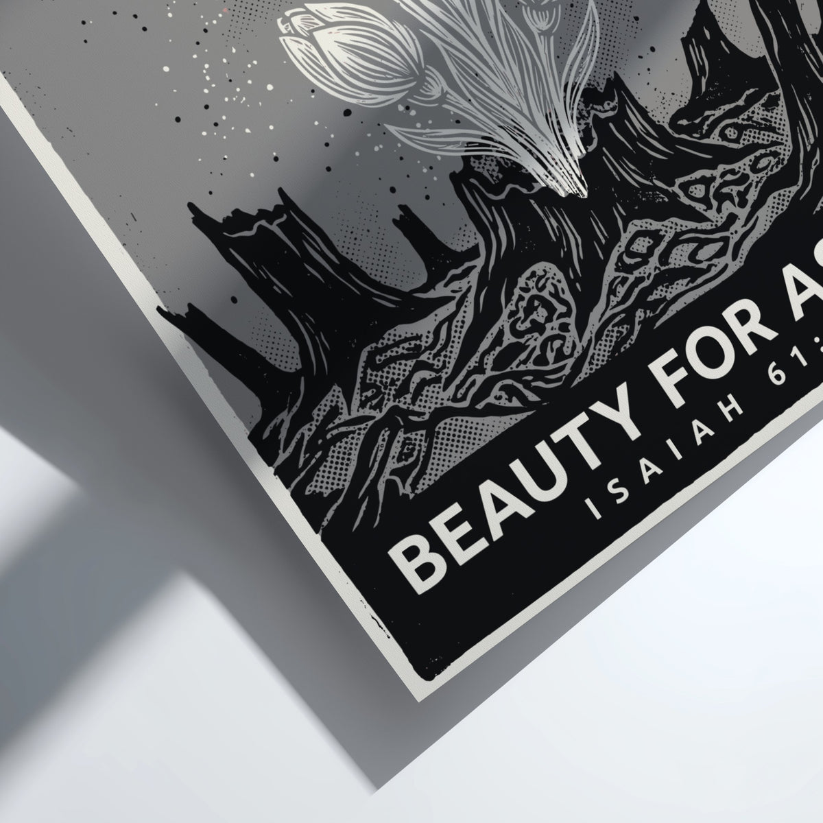 Poster featuring Beauty for Ashes text with white flowers growing from dark stumps