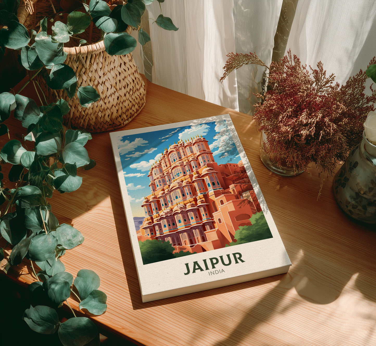 Canvas 'Jaipur, India' on a wooden table with plants around