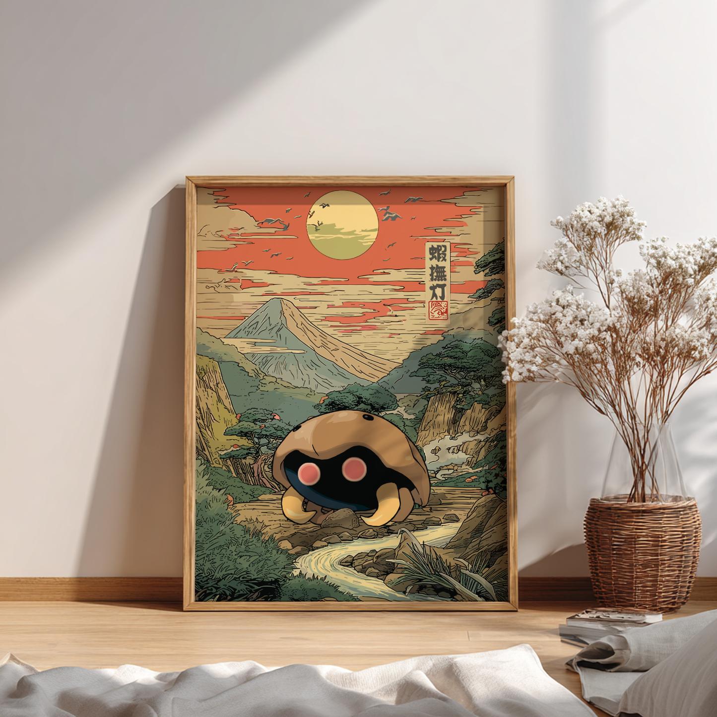Framed artwork of a mountain landscape with Kabuto Pokemon character in a forest, placed on a wooden floor.