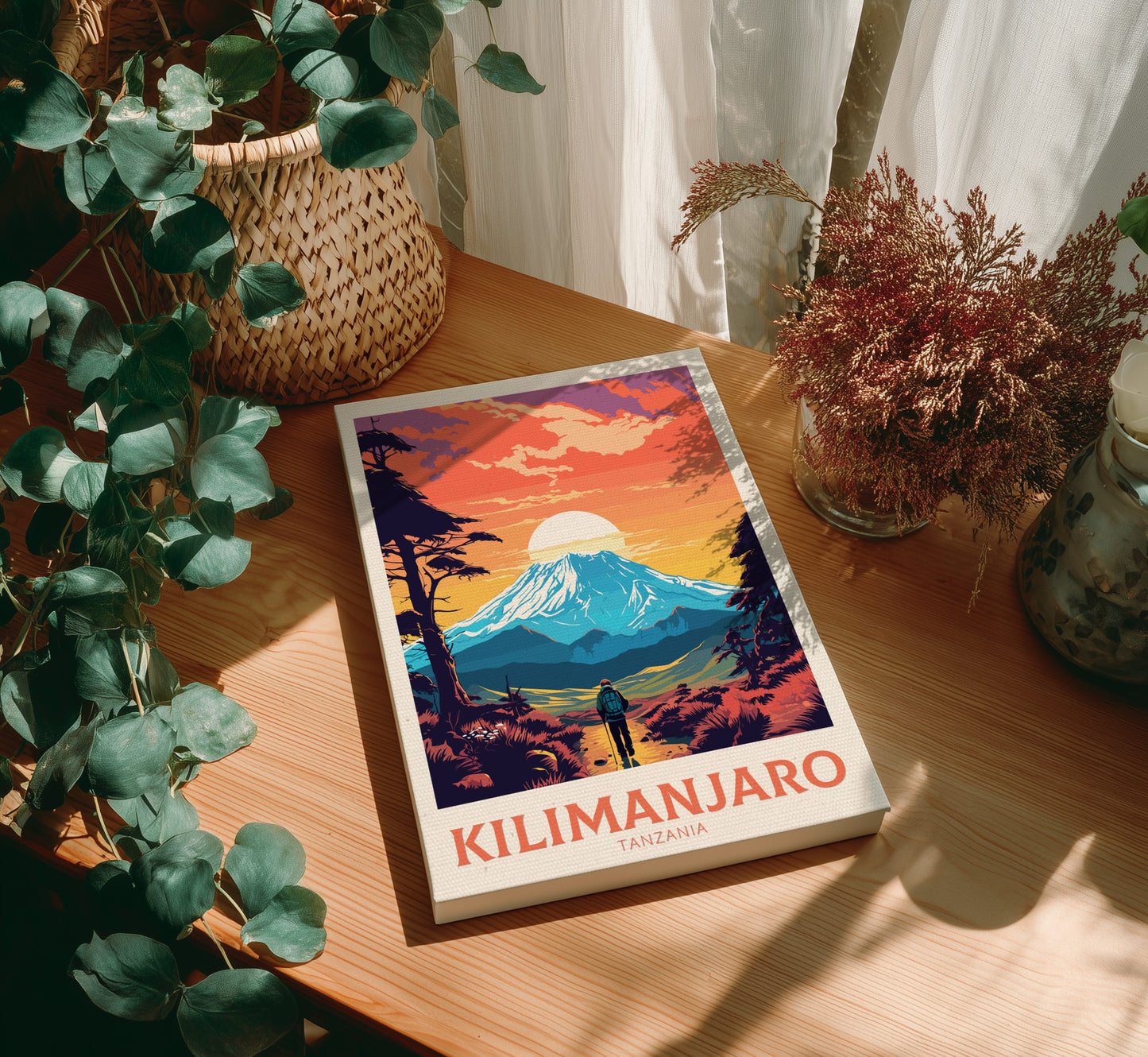 Canvas 'Kilimanjaro' on a wooden table with plants around