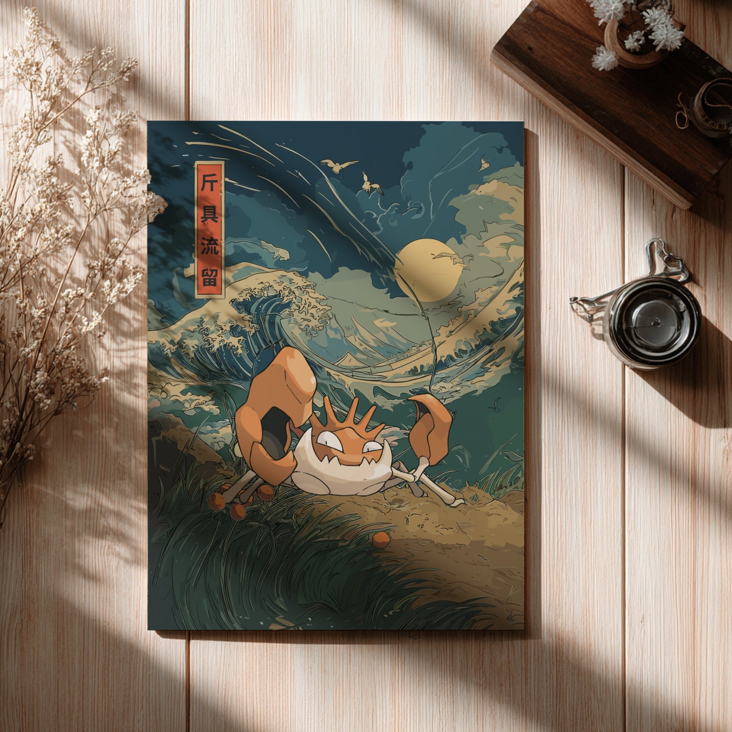 Framed artwork of Kingler Pokemon in a natural setting on a wooden surface.