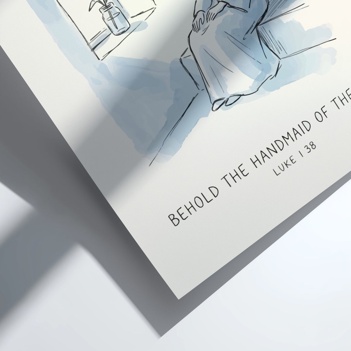 Poster featuring a minimalist blue line drawing of Mary with lily and scripture text.