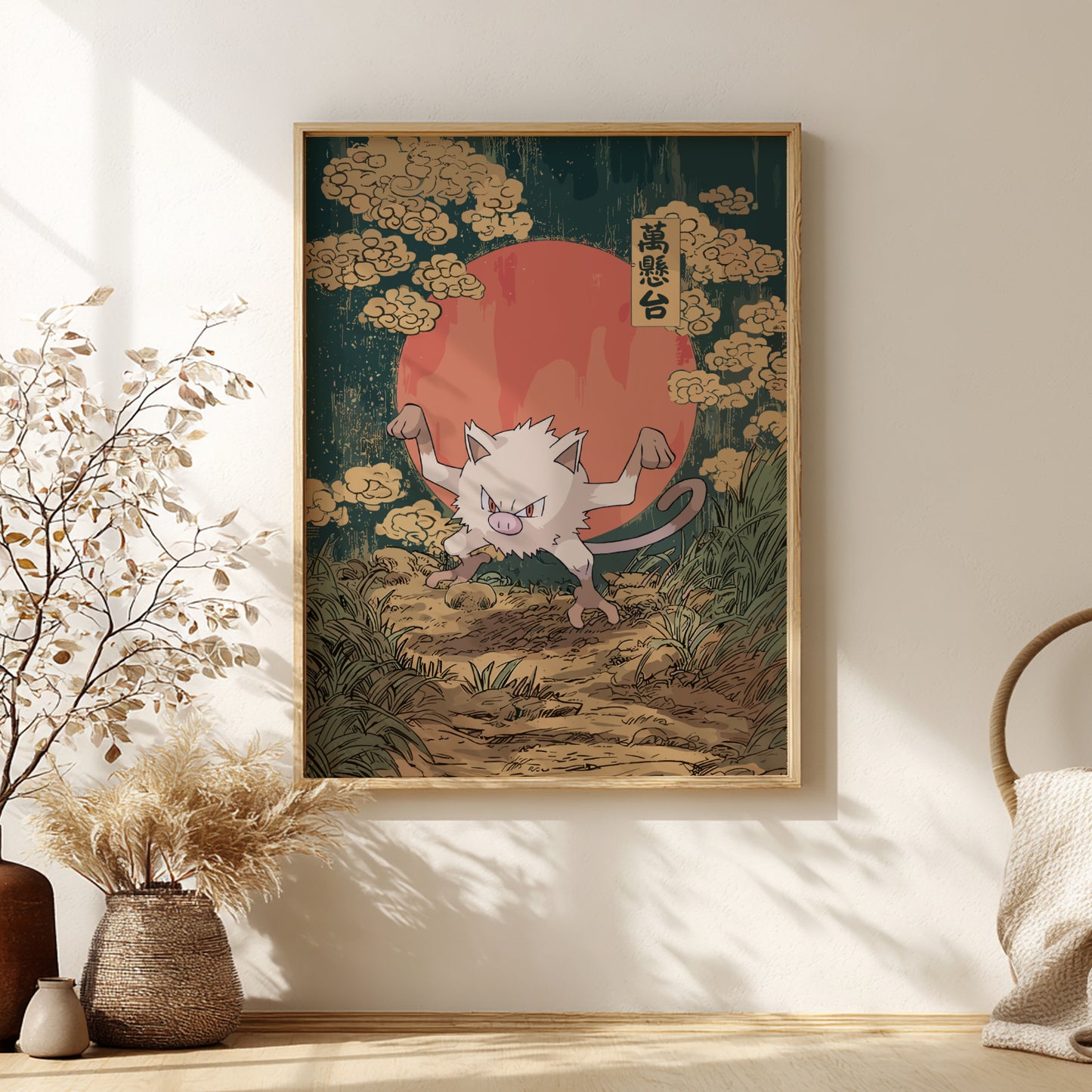 Framed artwork of Mankey Pokemon with a red sun and clouds in a room with decorative elements.
