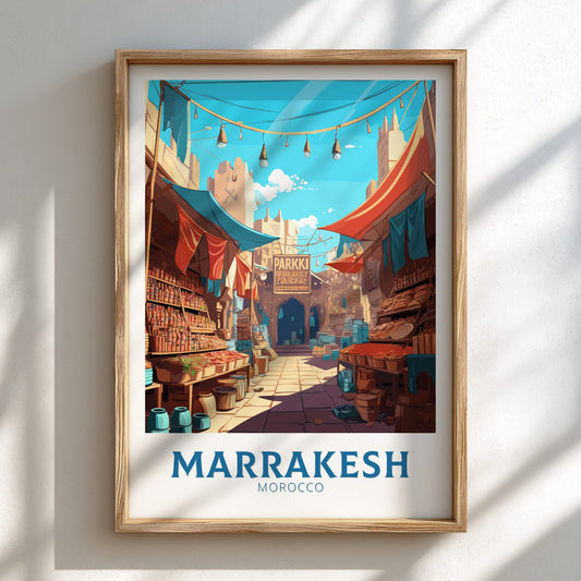 Framed artwork of a street scene in Marrakesh, Morocco on a white wall.