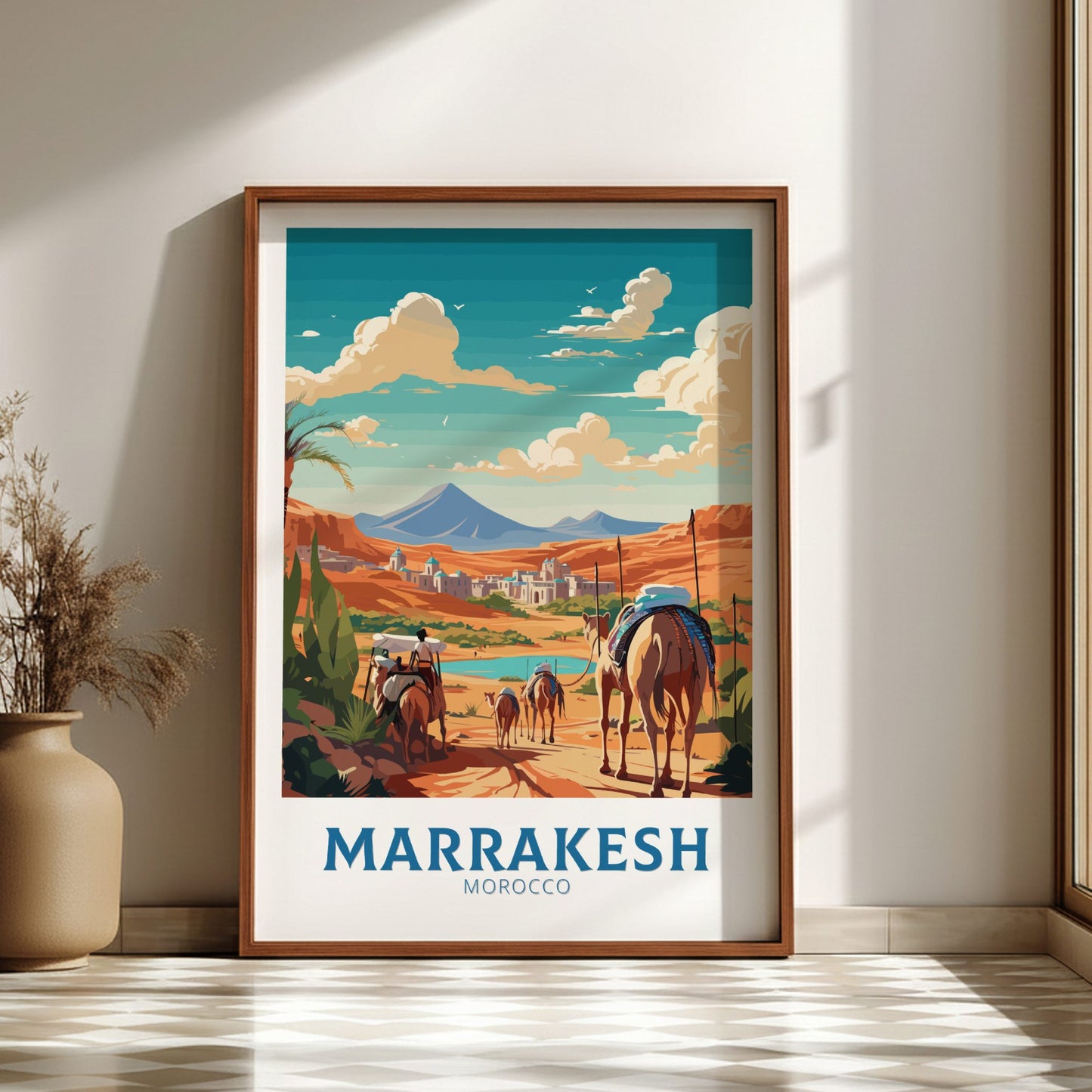 Framed artwork of Marrakesh, Morocco with horses and mountains on a wall.