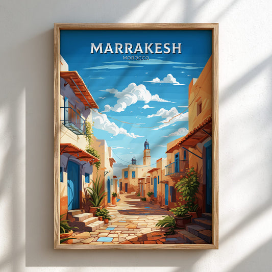 Framed artwork of a street scene in Marrakesh, Morocco with blue sky and white clouds.