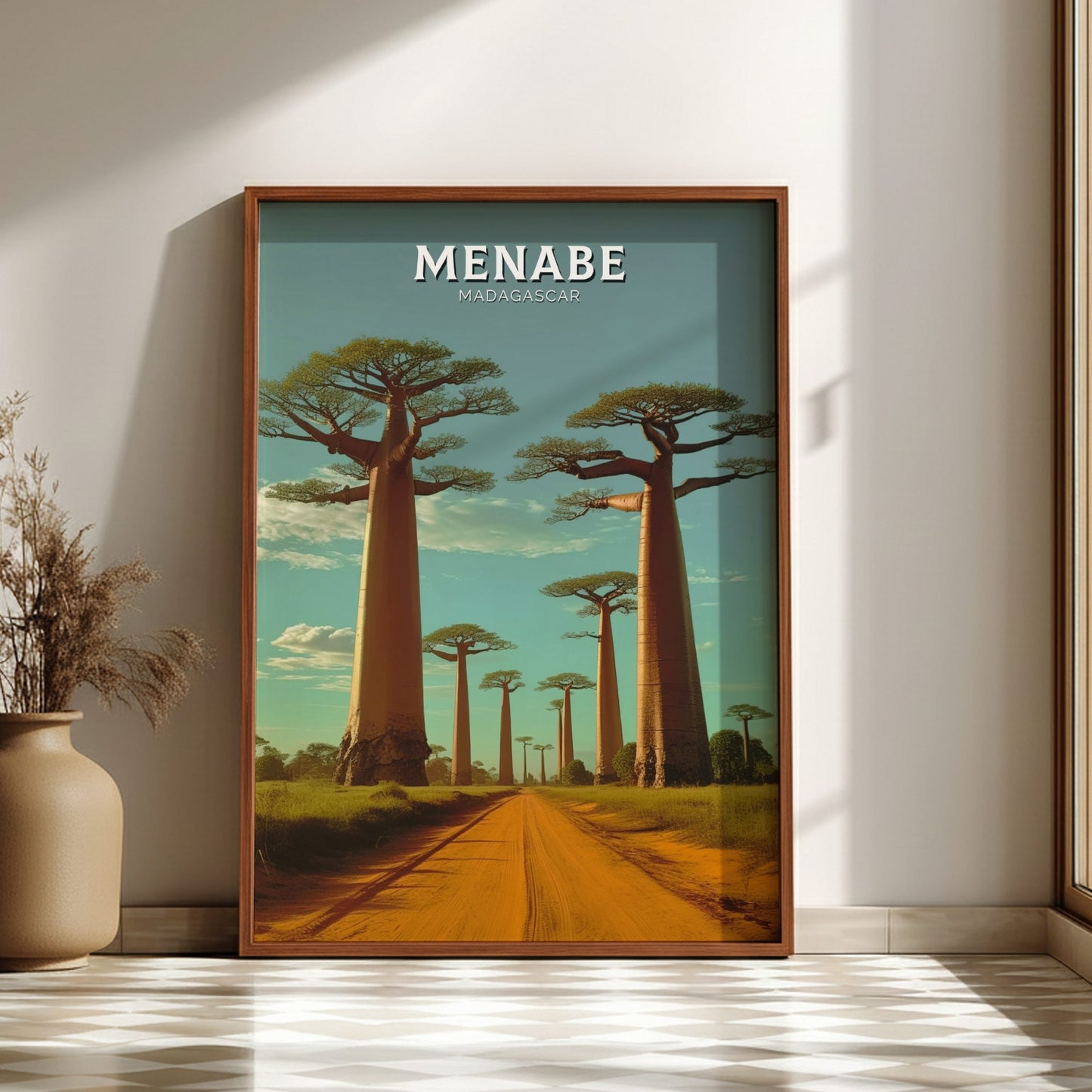 Framed artwork of a scenic landscape with trees and 'MENABE' branding on a wall.
