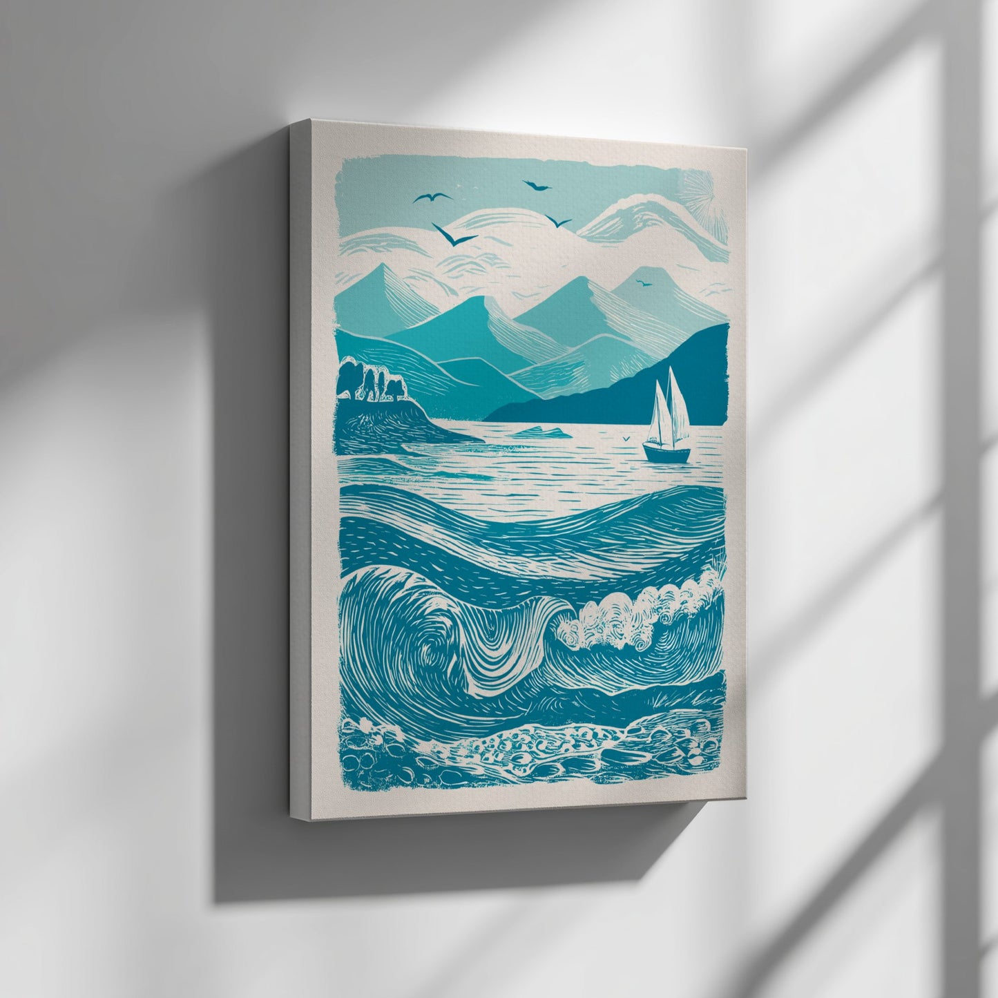 Framed artwork of a mountain and sea scene with a sailboat on a gray wall.