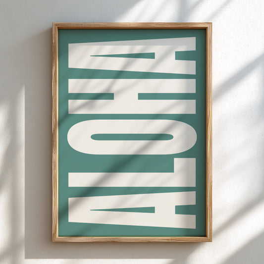 Framed artwork with 'ALOHA' text on a teal background