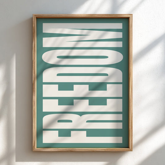 Framed artwork with the word 'FREEDOM' on a teal background