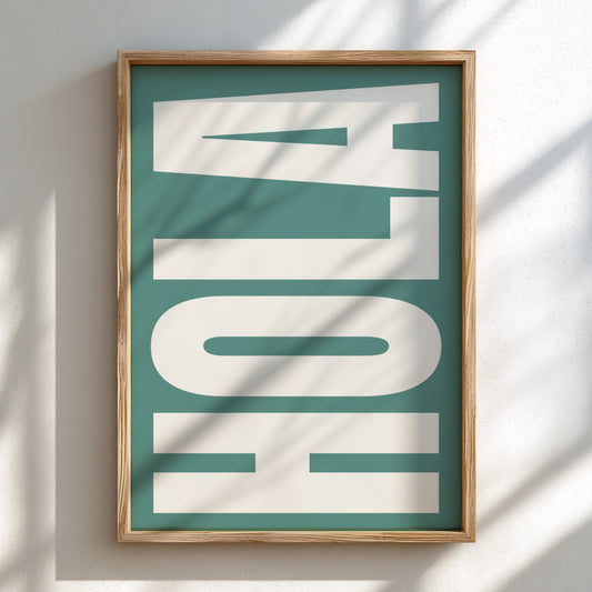 Framed artwork with 'Hola' text on a teal background
