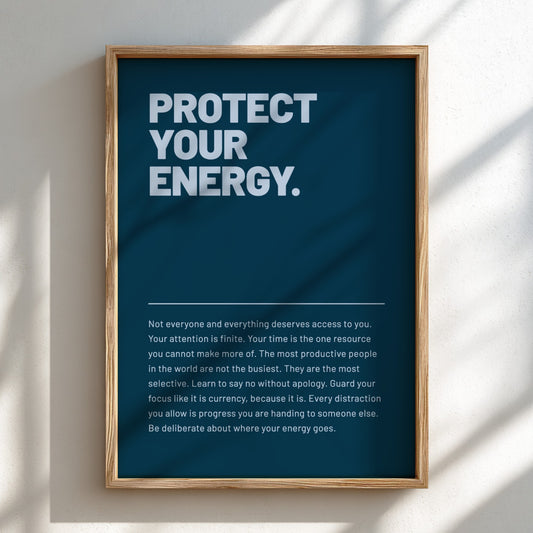 Framed poster with motivational text on a wall