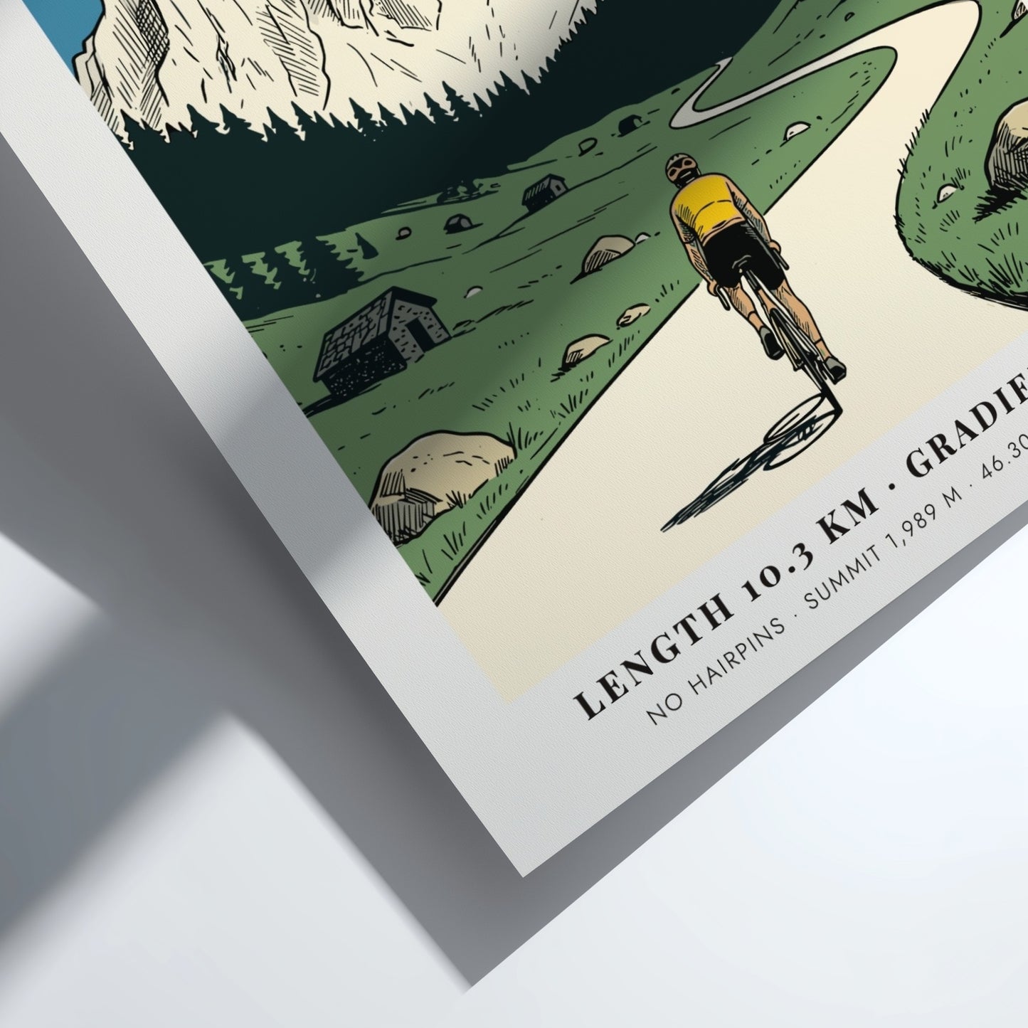 Poster of a cyclist climbing a mountain road toward the jagged Passo Rolle peaks.