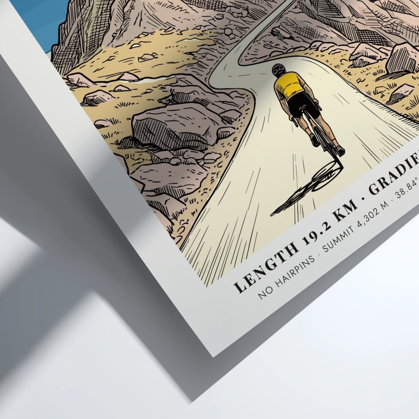 Poster featuring a cyclist climbing the winding Pikes Peak road in Colorado mountains